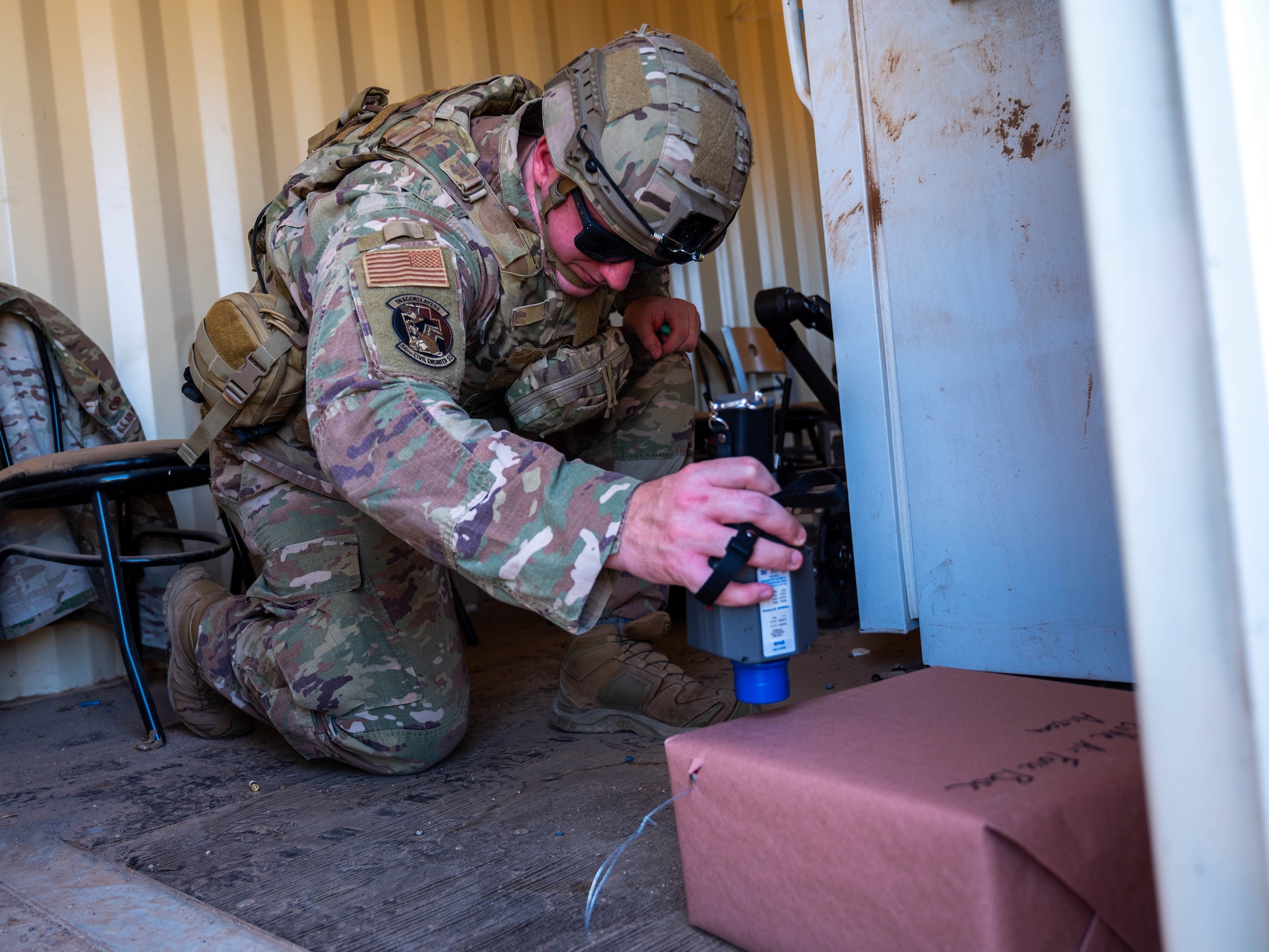 U.S. Air Force Staff Sgt. Zackary Stringer, 56th Civil Engineer Squadron explosive ordnance disposal technician, uses a radiological isotope identification device during training exercise Road RAPTER or Radiological Assistance Program Training for Emergency Response Sept. 7, 2023, at Luke Air Force Base, Arizona.