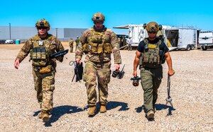 U.S. Air Force Senior Airman Steven Webb (left), Staff Sgt. Zackary Stringer (center), 56th Civil Engineer Squadron explosive ordnance disposal technicians, and Deputy Jason Schweizer (right), Maricopa County Sheriff‘s Office bomb technician, carry x-ray equipment during training exercise Road RAPTER  or Radiological Assistance Program Training for Emergency Response Sept. 7, 2023, at Luke Air Force Base, Arizona.