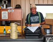 Stephen Bueschel, 5th Logistics Readiness Squadron property consolidation warehouse operator, poses for a photo at Minot Air Force Base, North Dakota, Aug. 30, 2023. Bueschel manages the staging area for reutilization of Minot AFB property. (U.S. Air Force photo by Senior Airman Evan Lichtenhan)