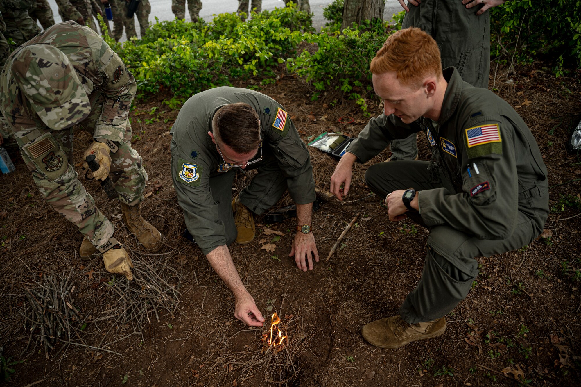 Airmen start a fire