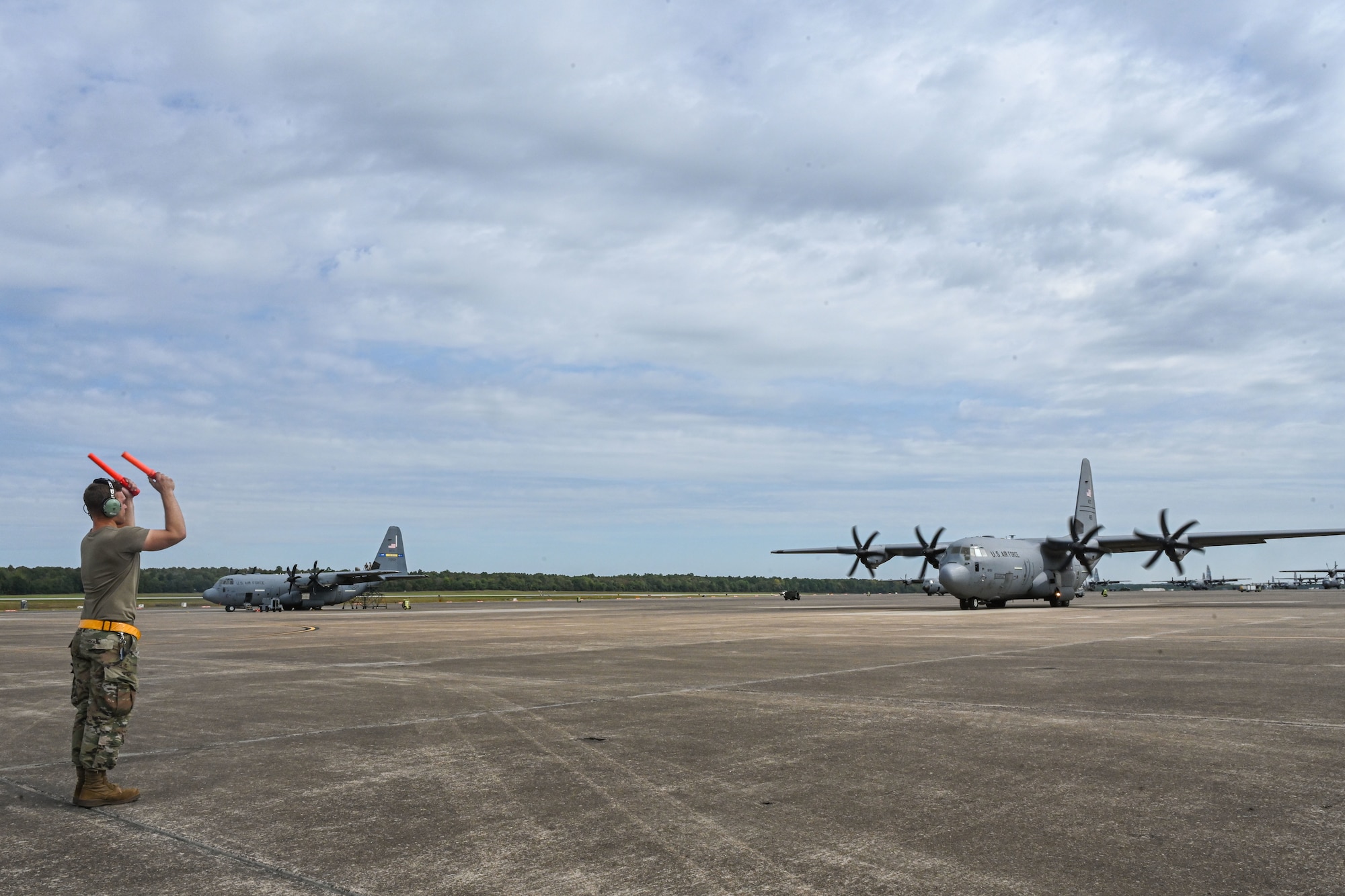 An Airman stands on the flightline.