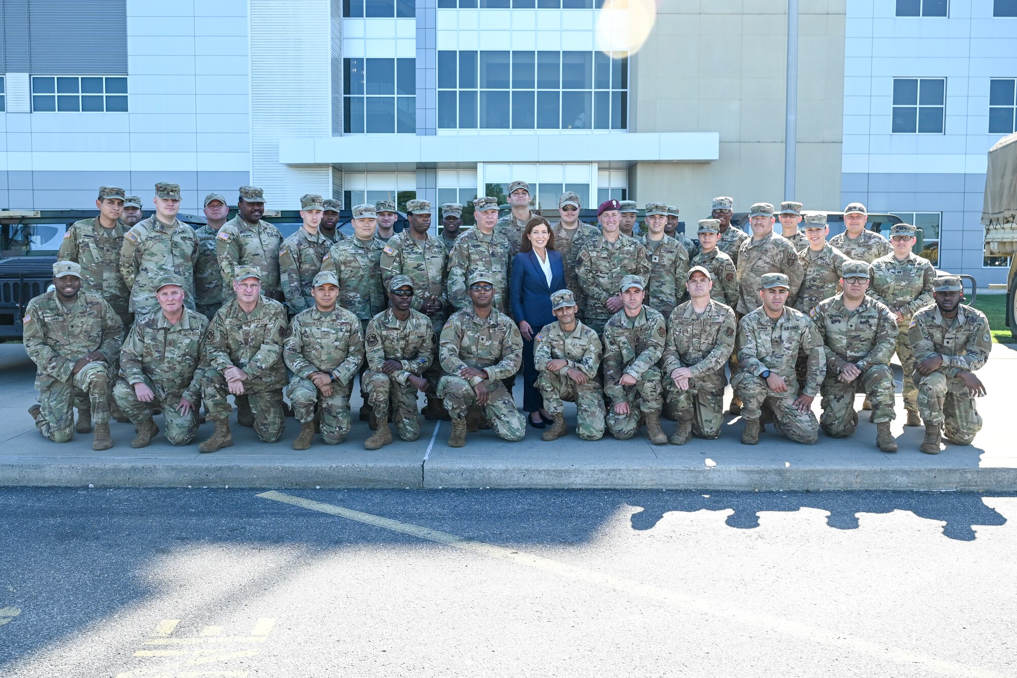 New York Governor Kathy Hochul poses for a photo with New York National Guard Soldiers and Airmen she mobilized in case Hurricane Lee hits Long Island, at the Farmingdale Armed Forces Reserve Center in Farmingdale, New York on Sept. 14, 2023. The governor deployed 50 troops and vehicles out of “an abundance of caution” as the storm made its way north along the East Coast. (U.S. Air National Guard photo by Staff Sgt. Daniel Farrell)