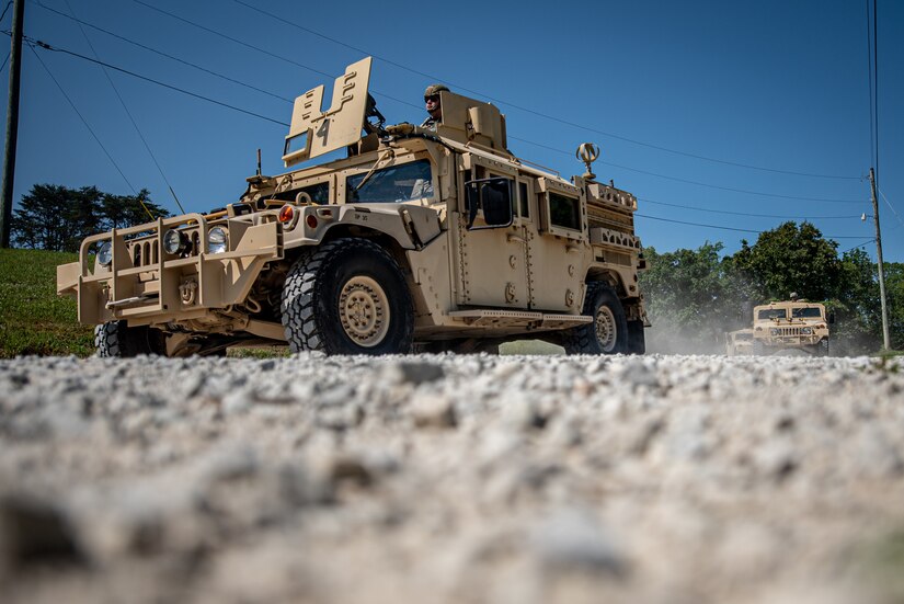 Airmen from the Kentucky Air National Guard’s 123rd Civil Engineer Squadron conduct tactical convoy operations during a training exercise in Shepherdsville, Ky., June 2, 2023. The purpose of the training was to promote multi-capable Airmen by training them on skills outside of their primary jobs. (U.S. Air National Guard photo by Tech. Sgt. Joshua Horton)