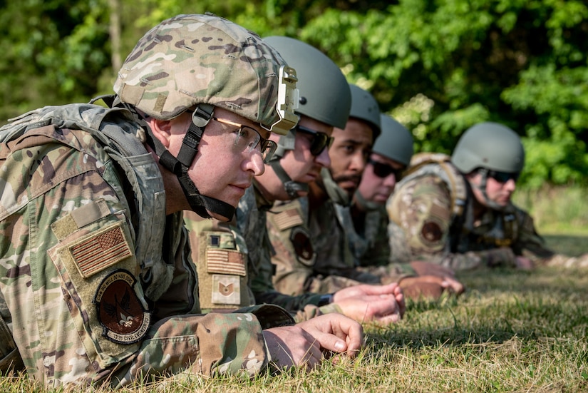 Airmen from the Kentucky Air National Guard’s 123rd Civil Engineer Squadron perform individual movement techniques during a training exercise in Shepherdsville, Ky., June 2, 2023. The purpose of the training was to promote multi-capable Airmen by training them on skills outside of their primary jobs. (U.S. Air National Guard photo by Tech. Sgt. Joshua Horton)