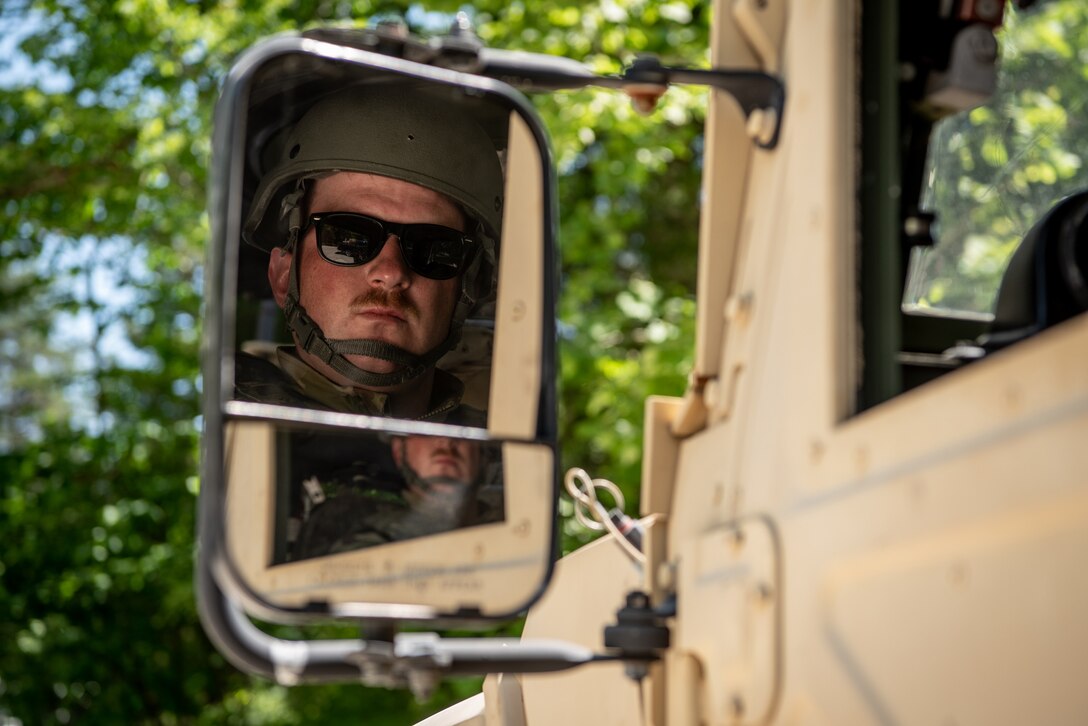 Tech. Sgt. Jacob Harris, a power production specialist with the Kentucky Air National Guard’s 123rd Civil Engineer Squadron, drives a humvee during a training exercise in Shepherdsville, Ky., June 2, 2023. The purpose of the training was to promote multi-capable Airmen by training them on skills outside of their primary jobs. (U.S. Air National Guard photo by Tech. Sgt. Joshua Horton)