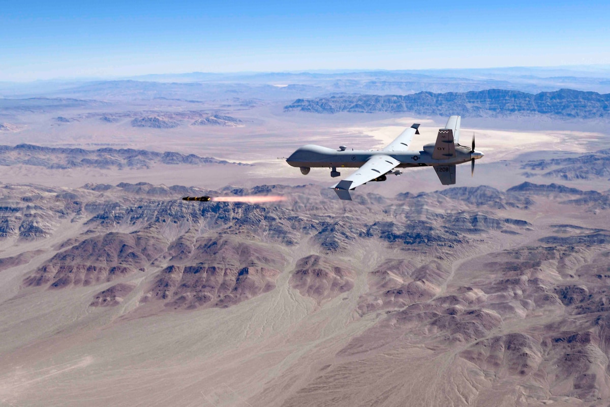 An MQ-9 Reaper, piloted by the 556th Test and Evaluation Squadron, fires an Air-to-Ground Missile-114 Hellfire missile