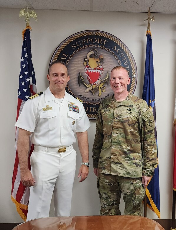 U.S. Navy Capt. Zachariah D. Aperauch, Commanding Officer of NSA Bahrain, stands for a photo with U.S. Army Col. William C. Hannan, Jr., U.S. Army Corps of Engineers Transatlantic Division commander, prior to a meeting to discuss ongoing base infrastructure projects supporting Naval Support Activity Bahrain, Sept. 11, 2023.