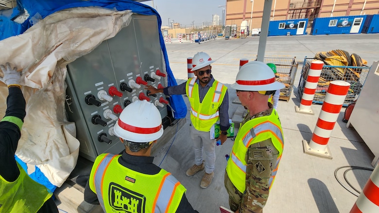 U.S. Army Corps of Engineers Transatlantic Middle East District’s Bahrain Area Office personnel explain the current progress on a base infrastructure project supporting U.S. Naval Forces Central Command and Naval Support Activity Bahrain to U.S. Army Col. William C. Hannan, Jr., Army Corps of Engineers Transatlantic Division commander, Sept. 11, 2023.