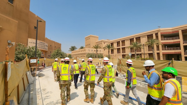 U.S. Army Corps of Engineers Transatlantic Division leadership and key Transatlantic Middle East District Bahrain Area Office personnel, discuss engineering updates during a site visit to view ongoing base infrastructure projects supporting U.S. Naval Forces Central Command and Naval Support Activity Bahrain, Sept. 11, 2023.