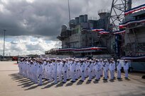 Sailors say farewell to the USS San Jacinto (CG 56) during the decommissioning ceremony in Norfolk Naval Base.