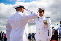 NORFOLK, Virginia (Sept. 15, 2023) – Lt. Cmdr. John Hill, Executive Officer, USS San Jacinto (CG 56), salutes sailors off the ship during the decommissioning ceremony of USS San Jacinto (CG 56).