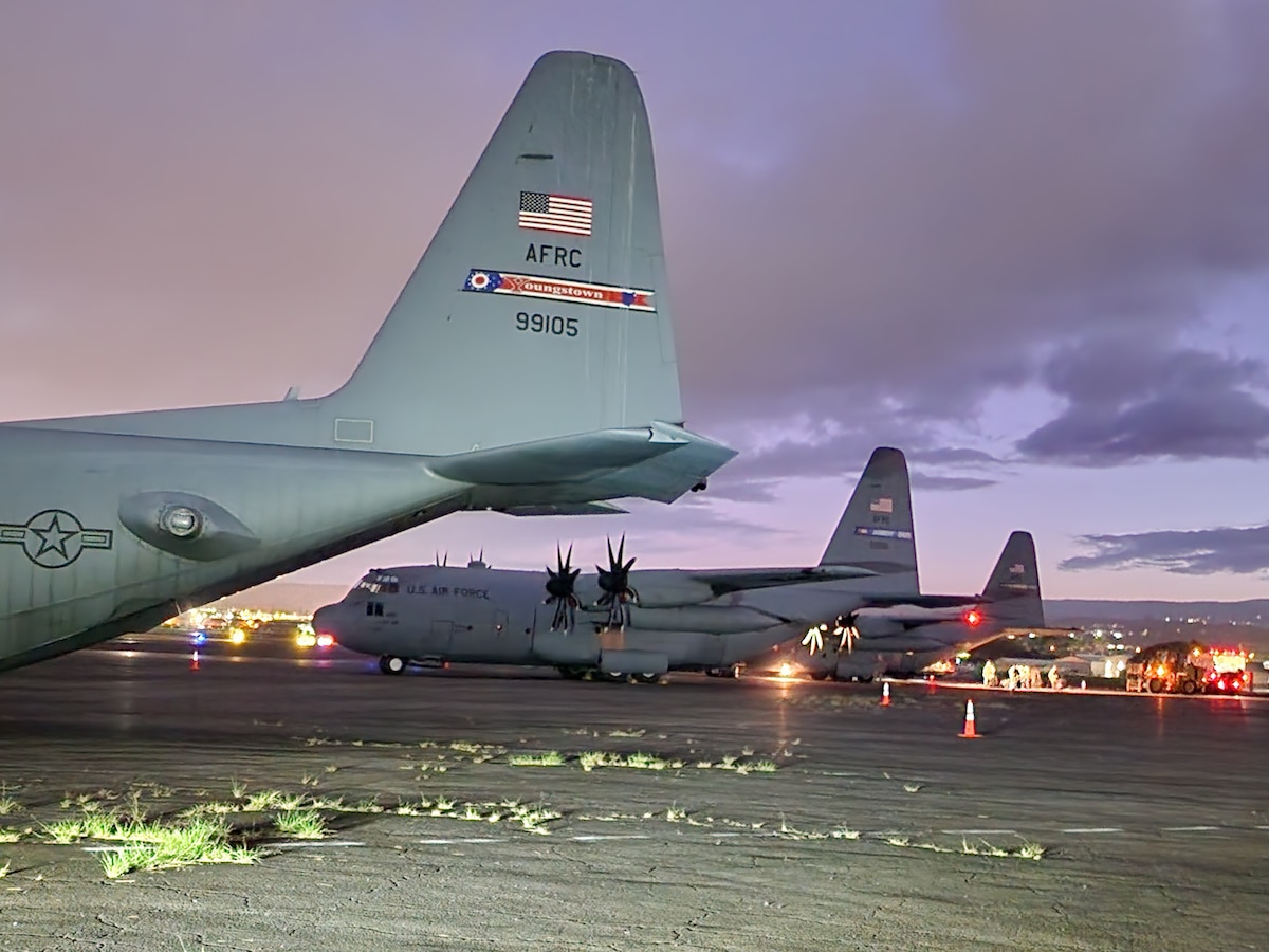 Multiple C-130s parked at Hilo International Airport after completing the drop off of cargo and passengers for the Rally in the Pacific exercise.