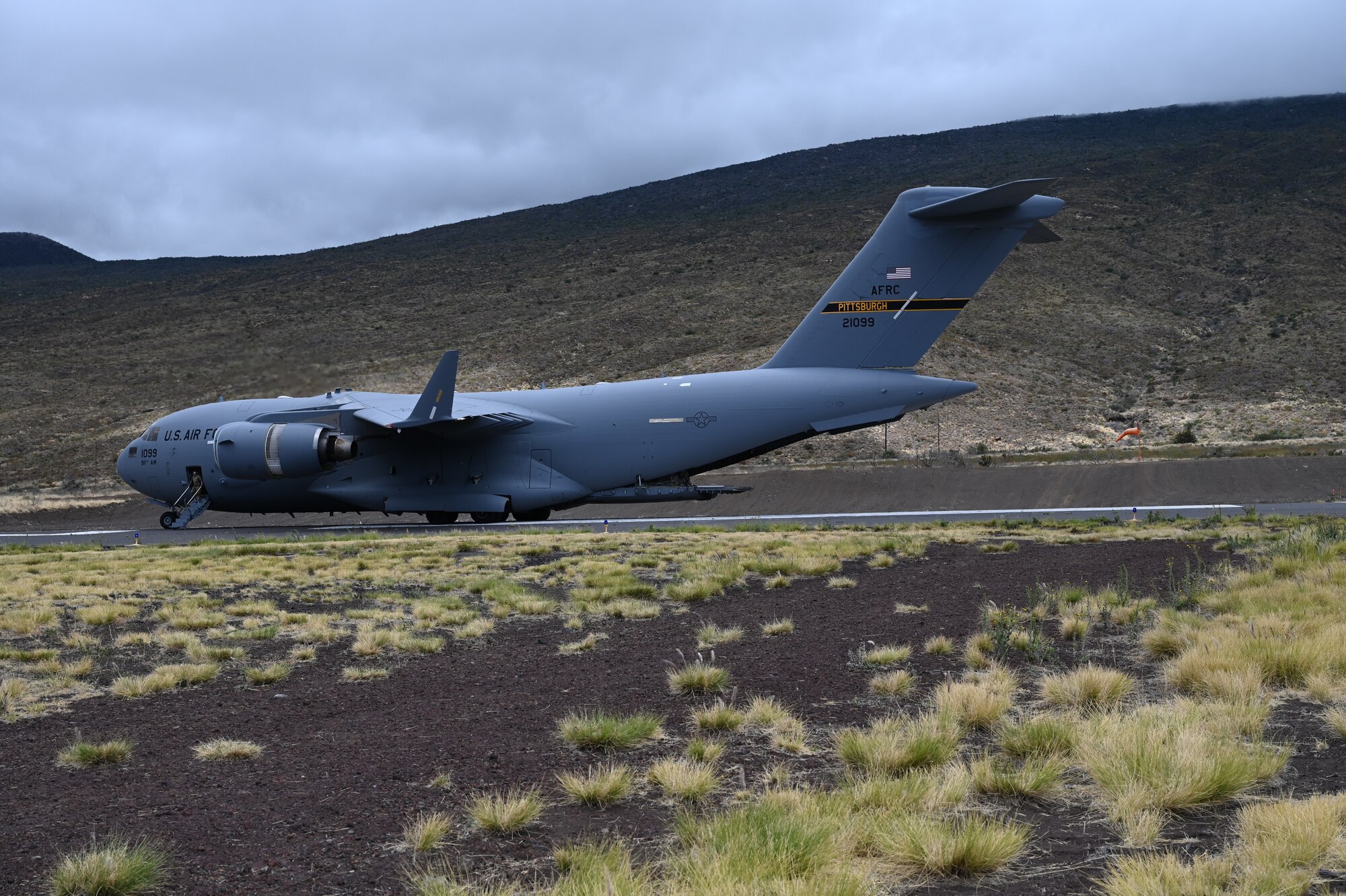C-17 Globemaster from the 911th Airlift Wing landed at the Bradshaw Army Air Field dropping off cargo and passengers for the Rally in the Pacific exercise.