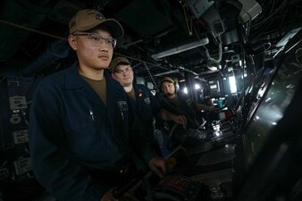 Sailors stand watch aboard USS Dewey (DDG 105) at Fleet Activities Yokosuka.