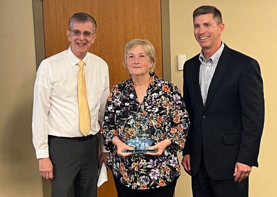 Joe Savage (Right), U.S. Army Corps of Engineers Great Lakes and Ohio River Division programs director, presents the Ron Keeling Civil Works Programming Excellence Award Aug. 29, 2023, to Connie Flatt, civil engineer and program manager in the Nashville District’s Planning, Program, and Project Management Division, during a ceremony at the division headquarters in Cincinnati, Ohio. Donald Johantges, Great Lakes and Ohio River Division Civil Works Integration Division chief, also participated in recognizing Flatt. (USACE Photo)