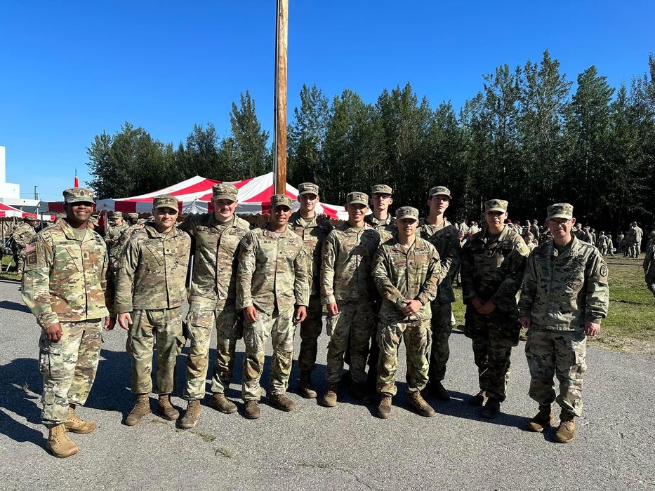 U.S. service members pose for a photo after the Expert Field Medical Badge graduation at Fort Wainwright, Alaska, July 21, 2023.