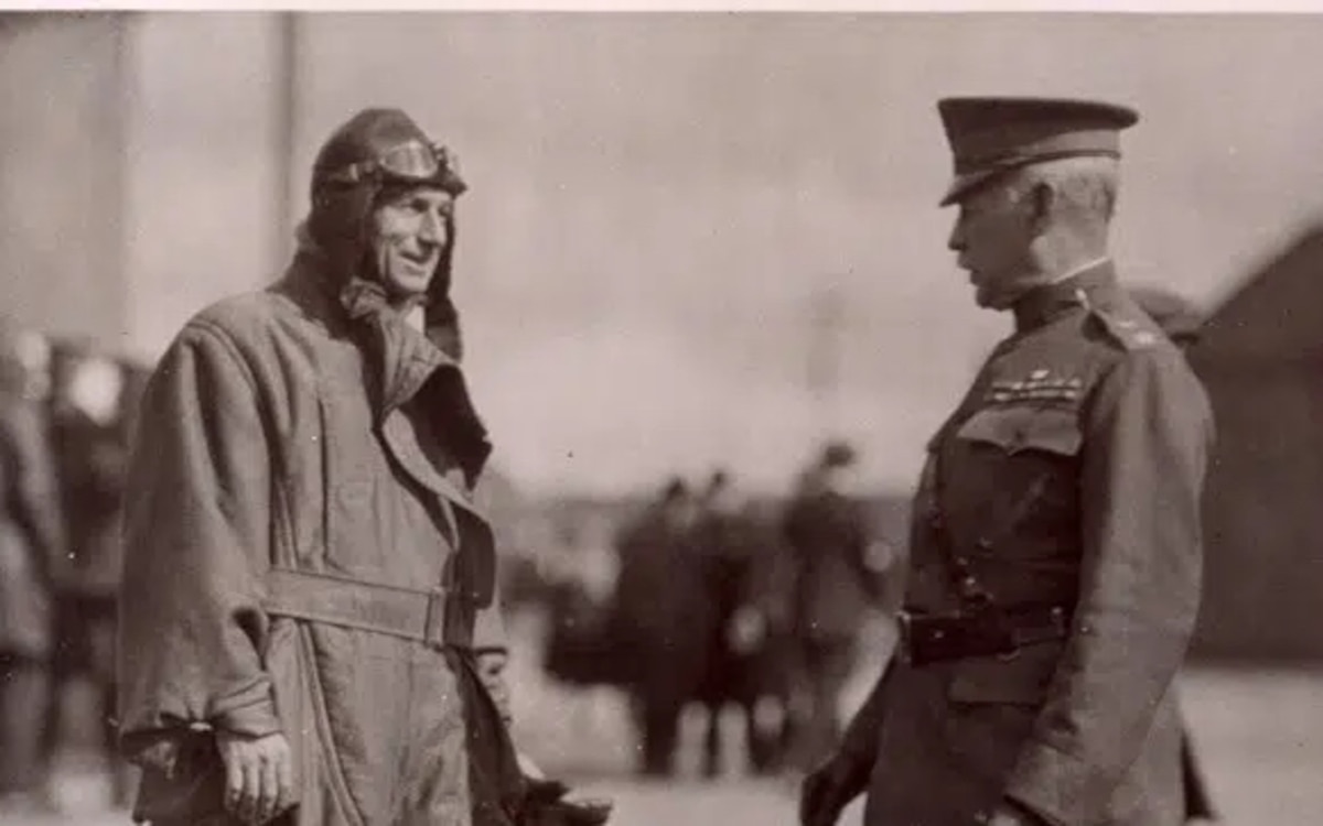 Brigadier General William "Billy" Mitchell (left) greets Major General Mason Patrick (right)