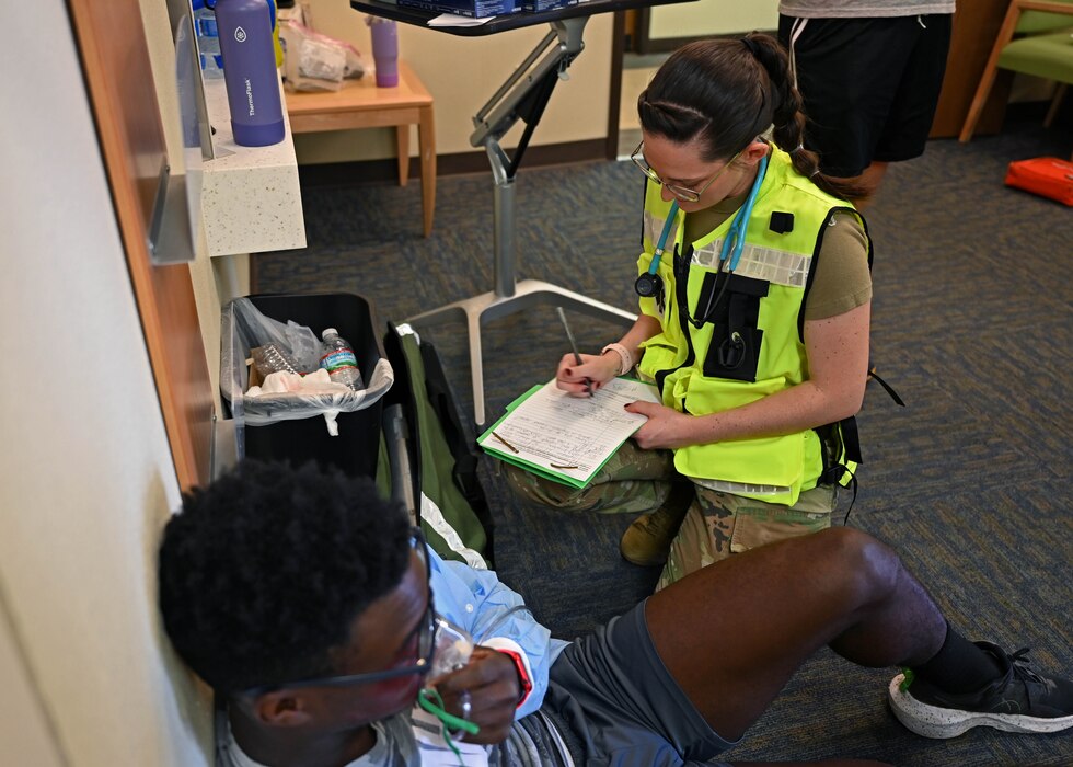 U.S. Air Force 1st Lt. Leah Corr, 17th Healthcare Operations Squadron physician assistant, documents a simulated patient’s treatment during a Ready EAGLE II exercise at Goodfellow Air Force Base, Texas, Sept. 14, 2023. Accurate documentation helped guide further decisions for the simulated patient's care. (U.S. Air Force photo by Senior Airman Sarah Williams)