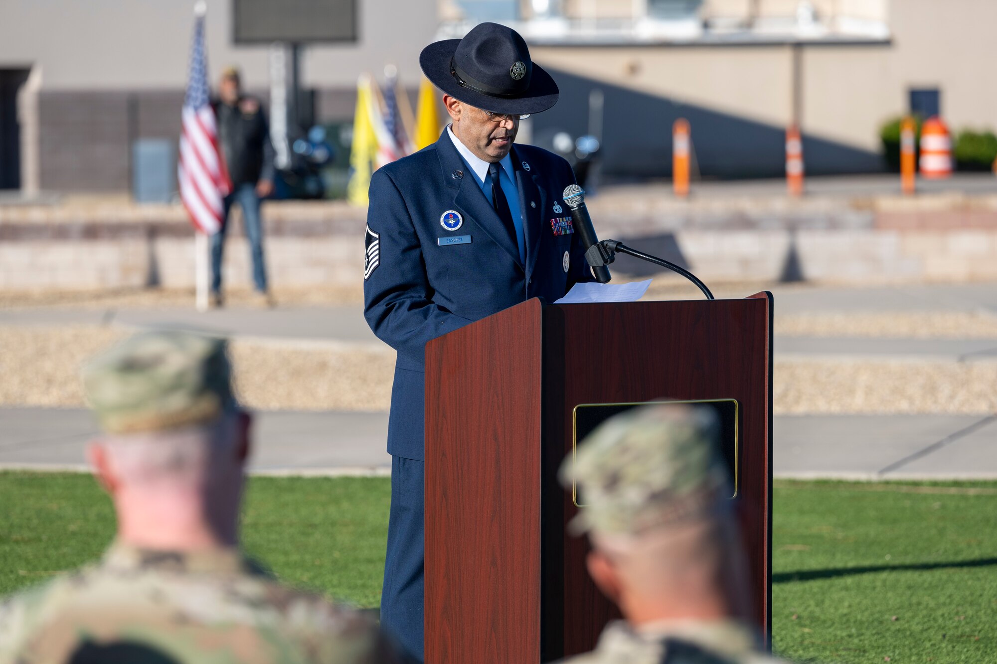 Retired U.S. Air Force Master Sgt. Paul Sanchez, a guest speaker during the POW/MIA Recognition Day, gives his remarks during a ceremony at Holloman Air Force Base, New Mexico, Sept. 15, 2023.