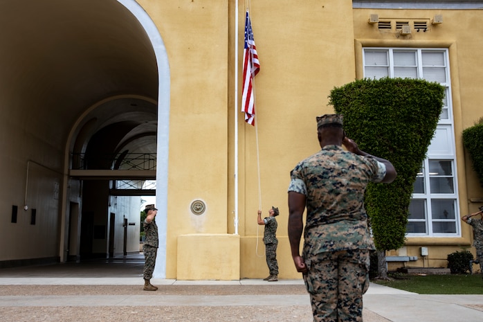 U.S. Marines with Headquarters and Service Battalion, Marine Corps Recruit Depot San Diego raise the American flag during a memorial ceremony for Military Working Dog Nero at MCRD San Diego, Sept. 18, 2023. MWD Nero showed great dedication and courage while working on MCRD San Diego from June 11, 2021 through Sept. 9, 2023. (U.S. Marine Corps photo by Sgt. Yvonna Guyette)