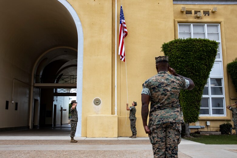 U.S. Marines with Headquarters and Service Battalion, Marine Corps Recruit Depot San Diego raise the American flag during a memorial ceremony for Military Working Dog Nero at MCRD San Diego, Sept. 18, 2023. MWD Nero showed great dedication and courage while working on MCRD San Diego from June 11, 2021 through Sept. 9, 2023. (U.S. Marine Corps photo by Sgt. Yvonna Guyette)