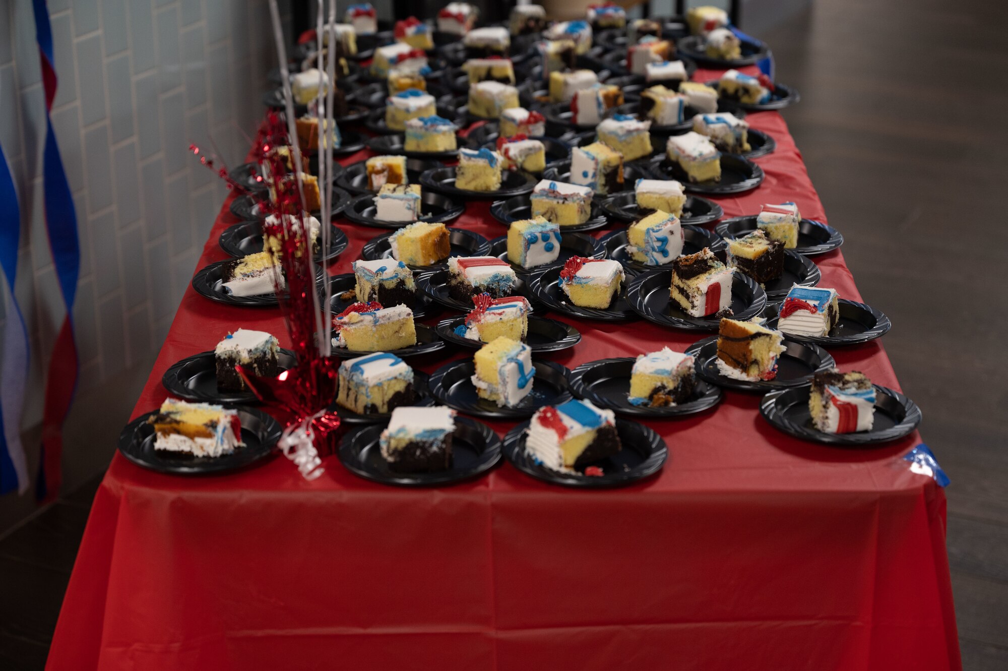 Photo of cake slices on a table.