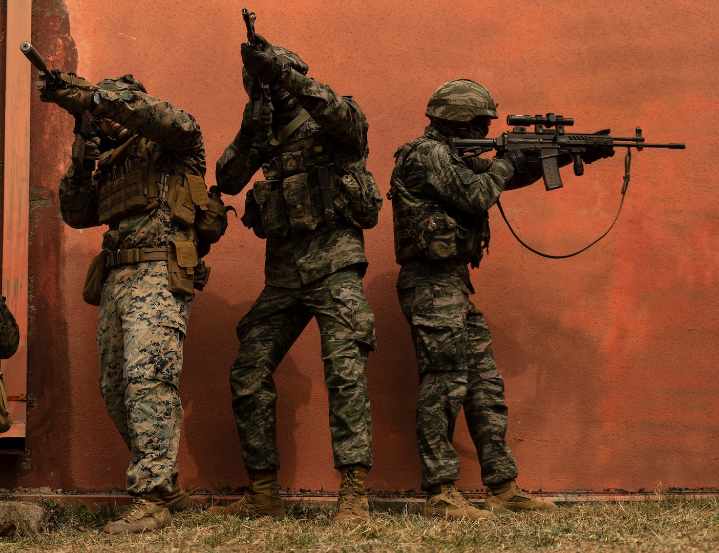 A U.S. Marine with 3rd Battalion, 6th Marines and Republic of Korea Marines with 3rd Battalion, 1st Regiment, 2nd Marine Division participate in a combined patrol during Korean Marine Exercise Program 23.3 at Rodriguez Live-fire Complex, Republic of Korea, March 28, 2023. KMEP is a series of continuous-combined training exercises designed to enhance the ROK-U.S. Alliance, promote stability on the Korean Peninsula, and strengthen combined military capabilities and interoperability. 3rd Battalion, 6th Marines is forward deployed in the Indo-Pacific under 4th Marines, 3rd Marine Division as part of the Unit Deployment Program.