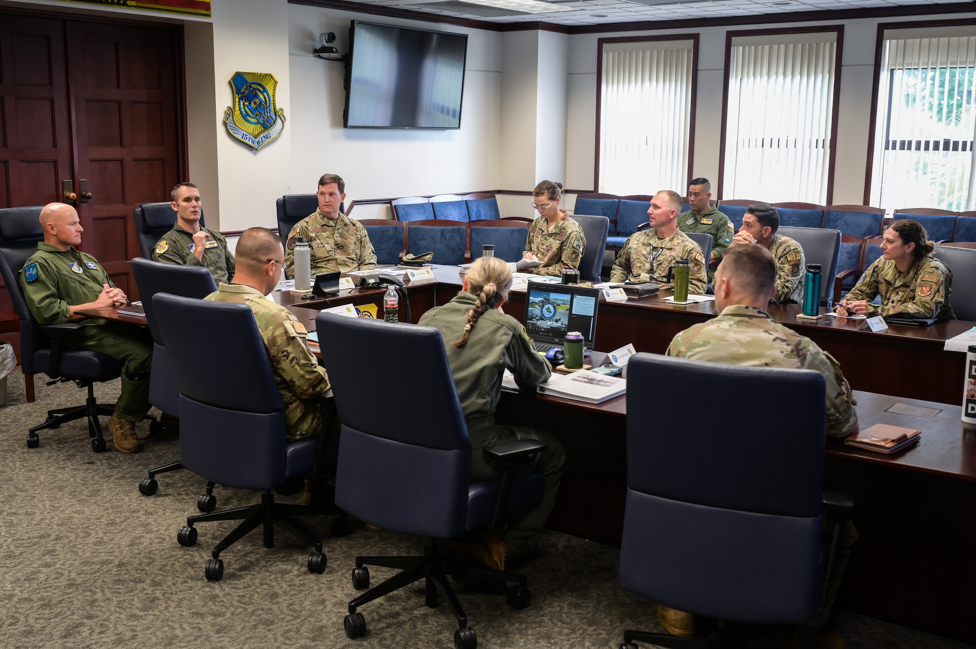 Col. Keith Young, 15th Wing deputy commander, gives an opening statement during a familiarization tour of Air Force installations on Joint Base Pearl Harbor-Hickam, Hawaii, Sept. 14, 2023. During the opening brief, Young provided oversight on joint base relations, operations and key leaders. (U.S. Air Force photo by Staff Sgt. Alan Ricker)