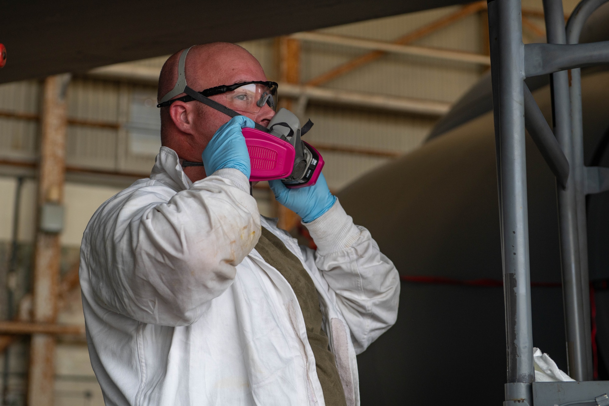 TSgt. Thompson removing his safety gear