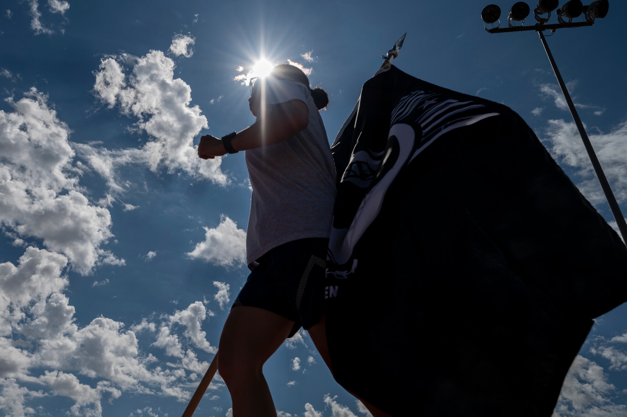 U.S. Air Force Master Sgt. Maria Stroemere, 635th Materiel Maintenance Support Squadron decentralized materiel support and inventory section chief, runs in honor of POW/MIA service members during POW/MIA Recognition Day at Holloman Air Force Base, New Mexico, Sept. 14, 2023.