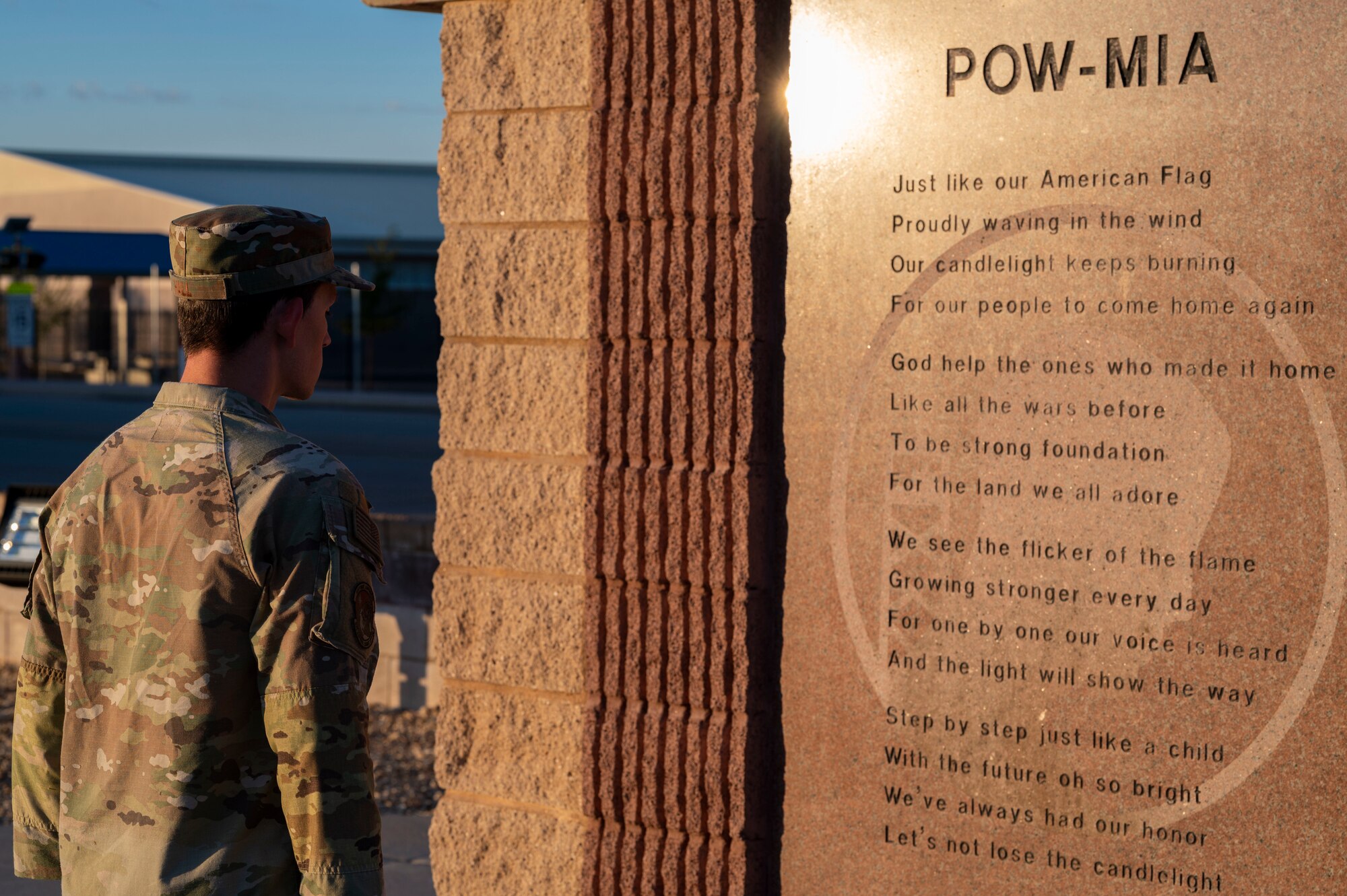 U.S. Air Force Staff Sgt. Jonathan Hall, 635th Materiel Maintenance Support Squadron service support supervisor, stands at the position of attention in front of a POW/MIA memorial at Holloman Air Force Base, New Mexico, Sept. 15, 2023.