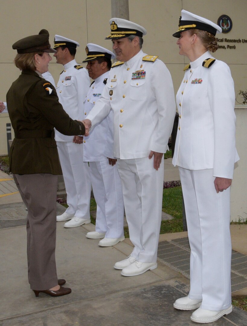 LIMA, Peru (Sept. 15, 2023) Gen. Laura Richardson, commander, U.S. Southern Command, greets Rear Admiral Jorge Enrique Andaluz Echevarría, Surgeon General of the Peruvian Navy, outside U.S. Naval Medical Research Unit (NAMRU) SOUTH. Richardson visited NAMRU SOUTH research facilities as part of a three-day tour of operations throughout Peru, to learn about the command’s ongoing research efforts between the U.S. and its partner nations in the SOUTHCOM region. NAMRU SOUTH, part of the Naval Medical Research & Development enterprise, conducts research on a wide range of infectious diseases of military and public health significance, and supports Global Health Engagement through surveillance of those diseases, including dengue fever, malaria, diarrheal diseases and sexually transmitted infections. (U.S. Navy photo by Monica Barrera/Released)