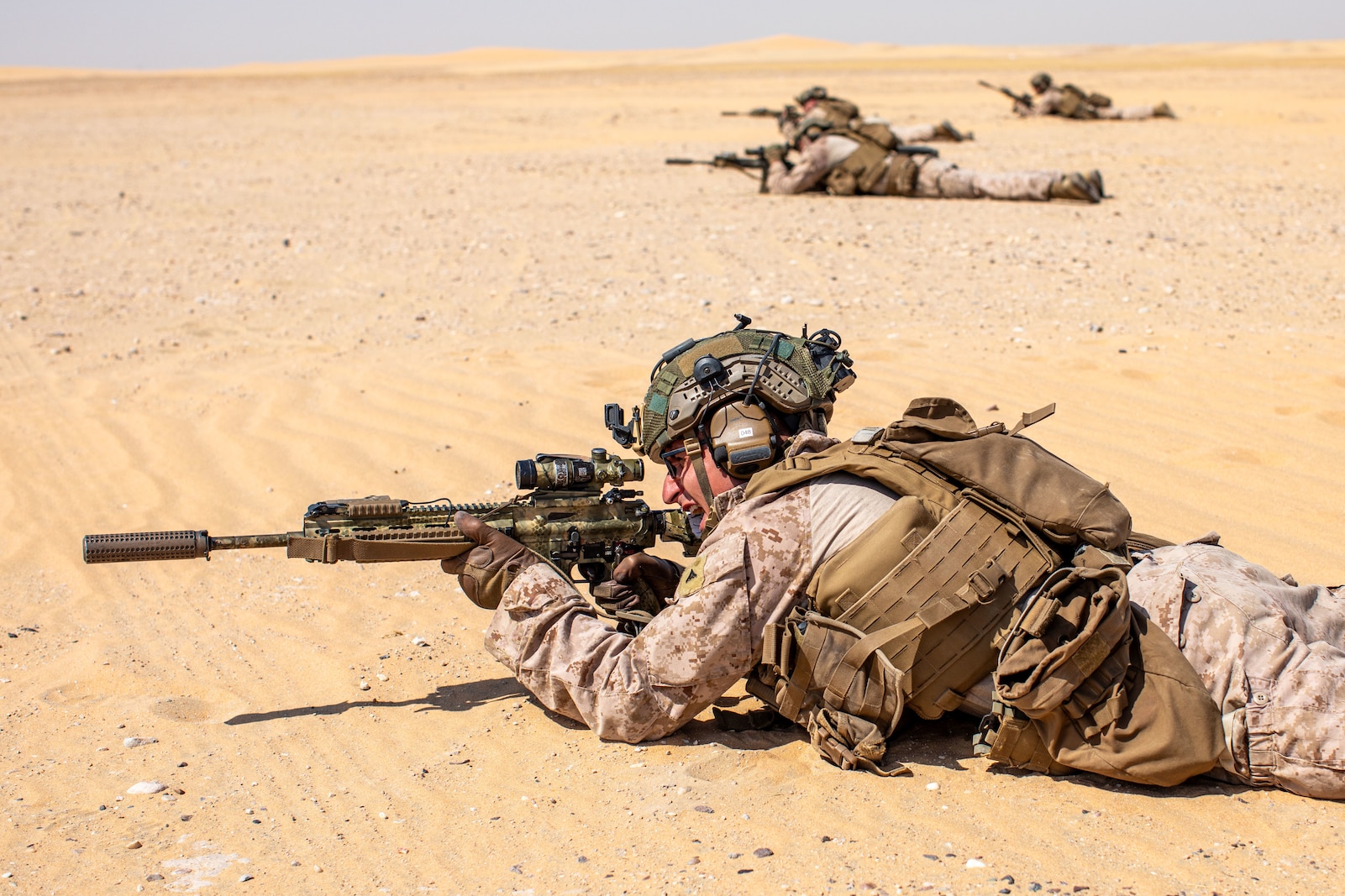 UDAIRI RANGE COMPLEX, Kuwait (Sept. 6, 2023) – U.S. Marines with Alpha Company, Battalion Landing Team 1/6, 26th Marine Expeditionary Unit (MEU) (Special Operations Capable) (26MEU(SOC)), establish a support by fire during an integrated platoon reinforced live-fire attack executed with Kuwaiti Marines at Udairi Range Complex, Kuwait, Sept. 6, 2023. Elements of the 26th MEU(SOC) conducted bilateral training with Kuwait armed forces to increase interoperability, maintain operational readiness, and strengthen relationships with partner forces. Components of the Bataan Amphibious Ready Group and 26th MEU(SOC) are deployed to the U.S. 5th Fleet area of operations to help ensure maritime security and stability in the Middle East region. (U.S. Marine Corps photo by Gunnery Sgt. Jeffrey Cordero)