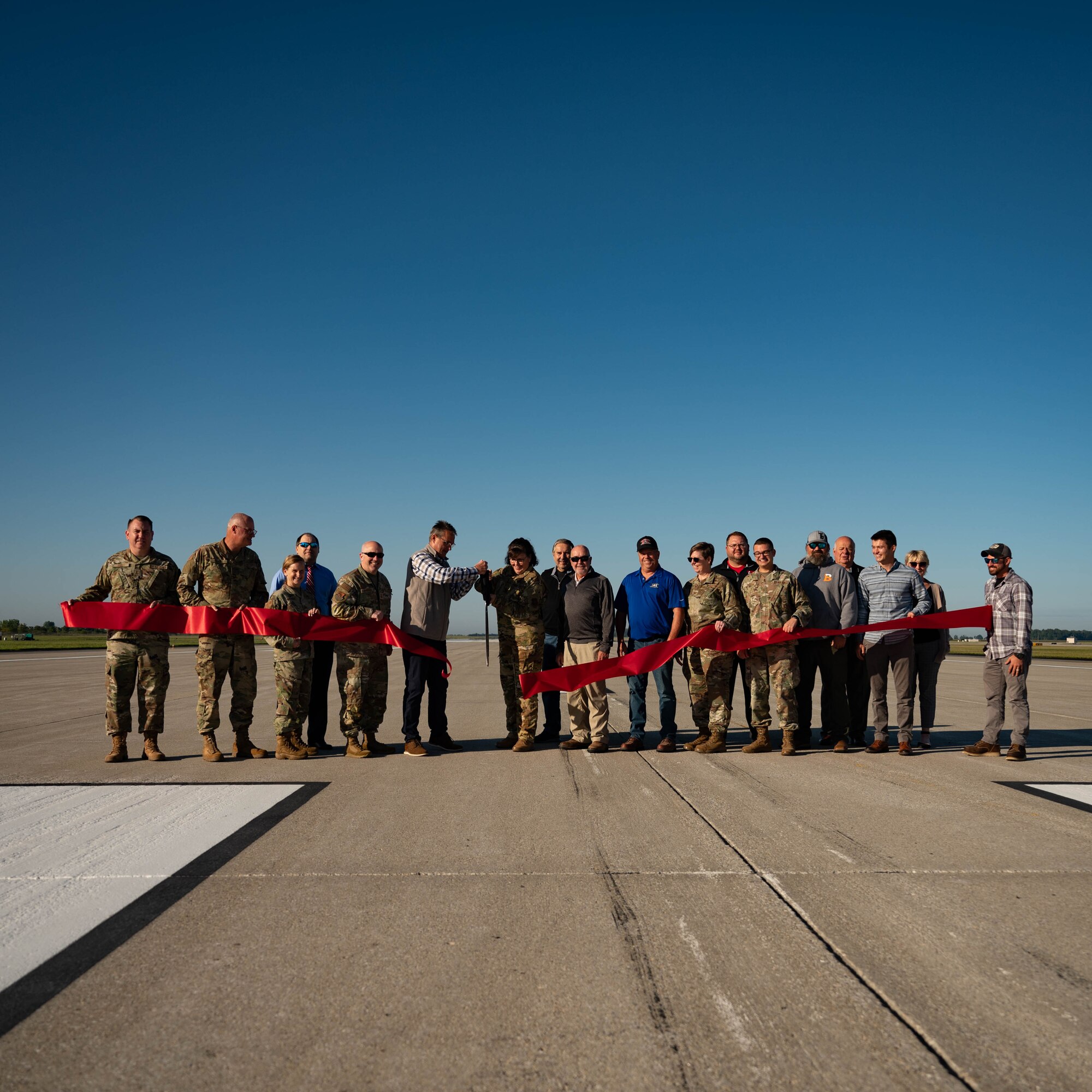 434th Air Refueling Wing commander, Col. Summer Fields, officially opens the newly renovated runway during a ribbon cutting ceremony at Grissom Air Reserve Base, Ind. on September 18, 2023. The runway reopened following a $60 million renovation project. For the past 150 days, Grissom's aircraft and personnel that maintain and fly those aircraft have operated out of nearby Fort Wayne while the project was completed. (U.S. Air Force photo by Master Sgt. Josh Weaver)