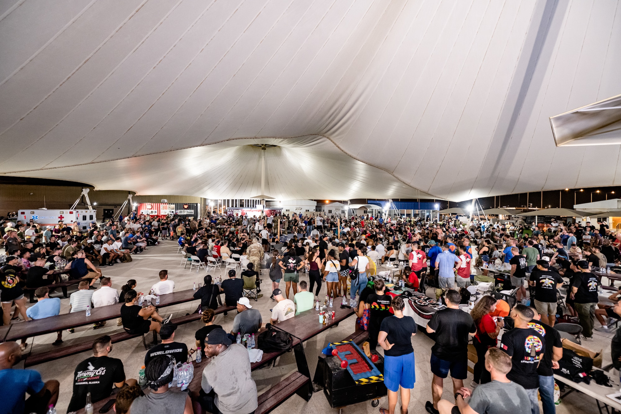 Crowd around a boxing ring