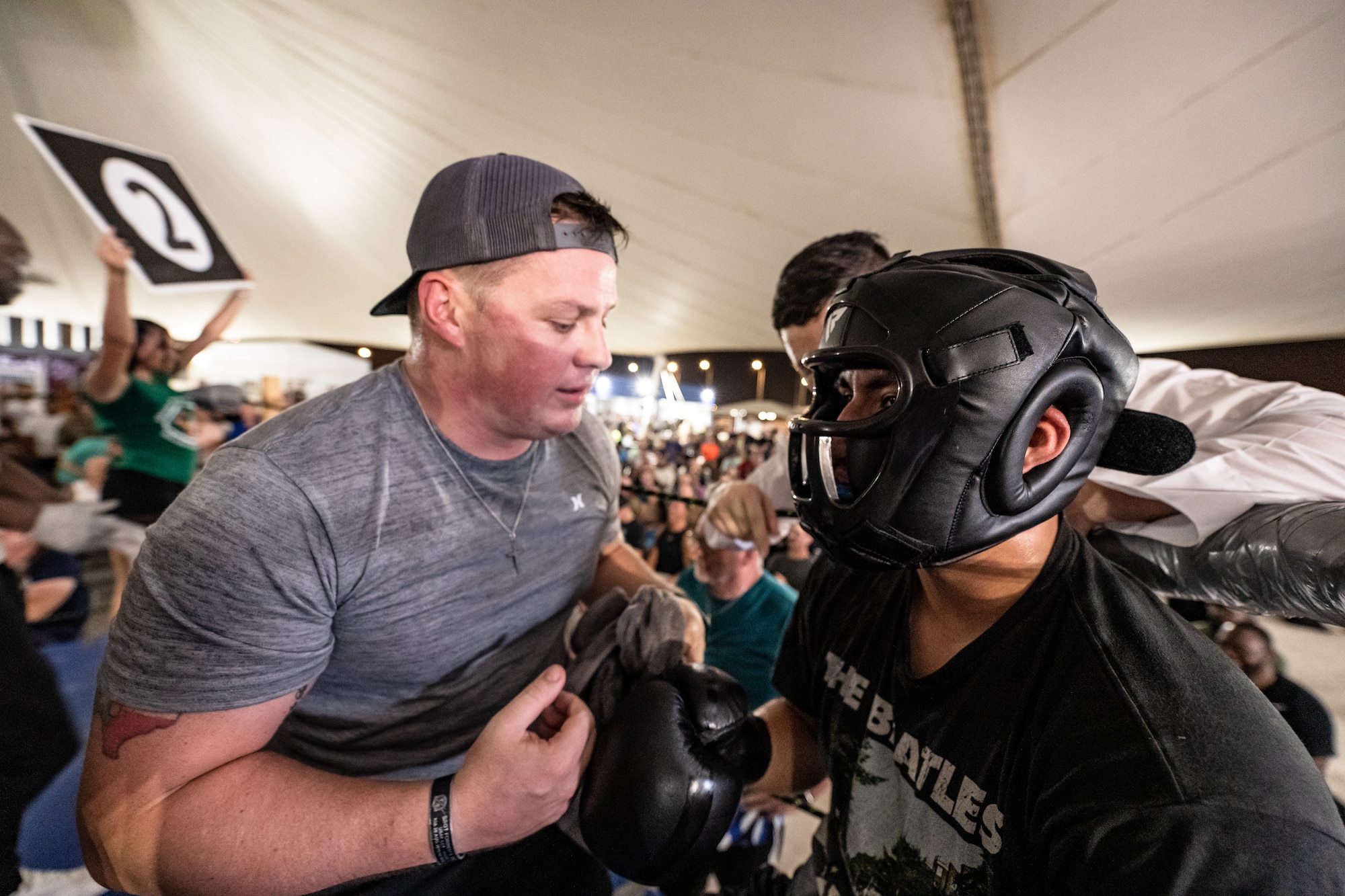 Person coaching a boxer