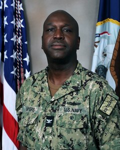 Captain Thomas E. Myers, Executive Officer, Expeditionary Warfare Training Group, Atlantic (EWTGLANT) poses for an official studio portrait.