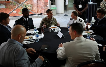 Maj. Gen. Stanton visits with students during TechNet Augusta.