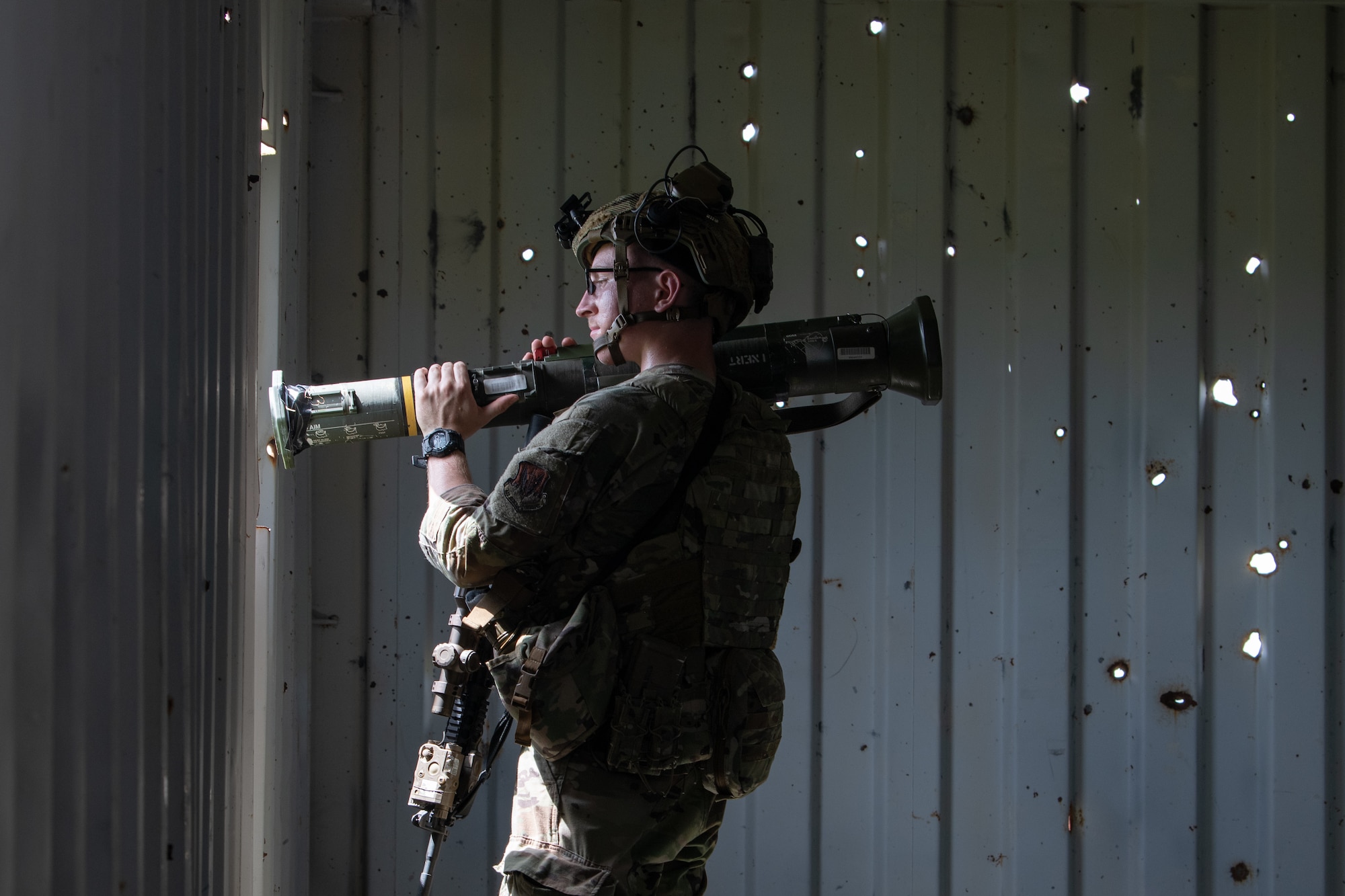 A U.S. Air Force Airman from the 824th Base Defense Squadron defends a contingency location with an AT4 shoulder-fired rocket system at Avon Park Air Force Range, Florida, August 22, 2023. 824th BDS Airmen use an array of munitions to provide security and defense against multiple threat types. 824th BDS Airmen proved they were ready to provide security and support for upcoming Lead Wing operations through their mission readiness exercise. (U.S. Air Force photo by 1st Lt. Christian Little)