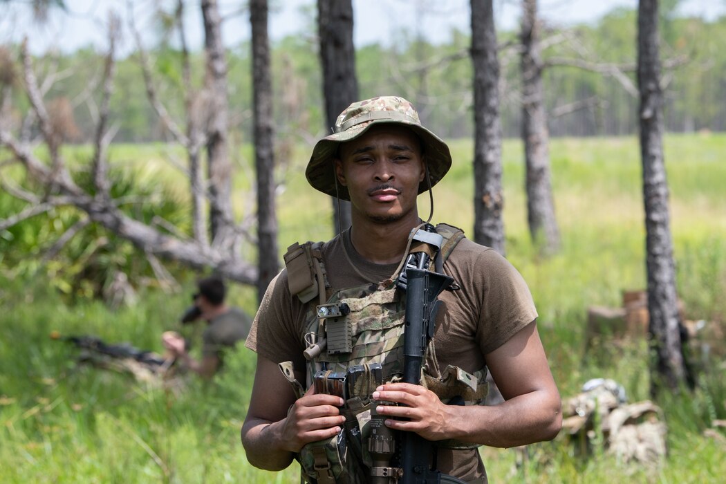 A U.S. Air Force Airman from the 824th Base Defense Squadron stands at a contingency location at Avon Park Air Force Range, Florida, August 22, 2023. 824th BDS Airmen proved they were ready to provide security and support for upcoming Lead Wing operations through their mission readiness exercise. (U.S. Air Force photo by 1st Lt. Christian Little)
