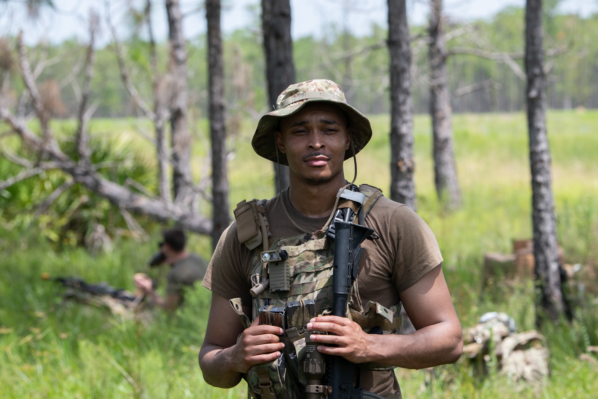 A U.S. Air Force Airman from the 824th Base Defense Squadron stands at a contingency location at Avon Park Air Force Range, Florida, August 22, 2023. 824th BDS Airmen proved they were ready to provide security and support for upcoming Lead Wing operations through their mission readiness exercise. (U.S. Air Force photo by 1st Lt. Christian Little)