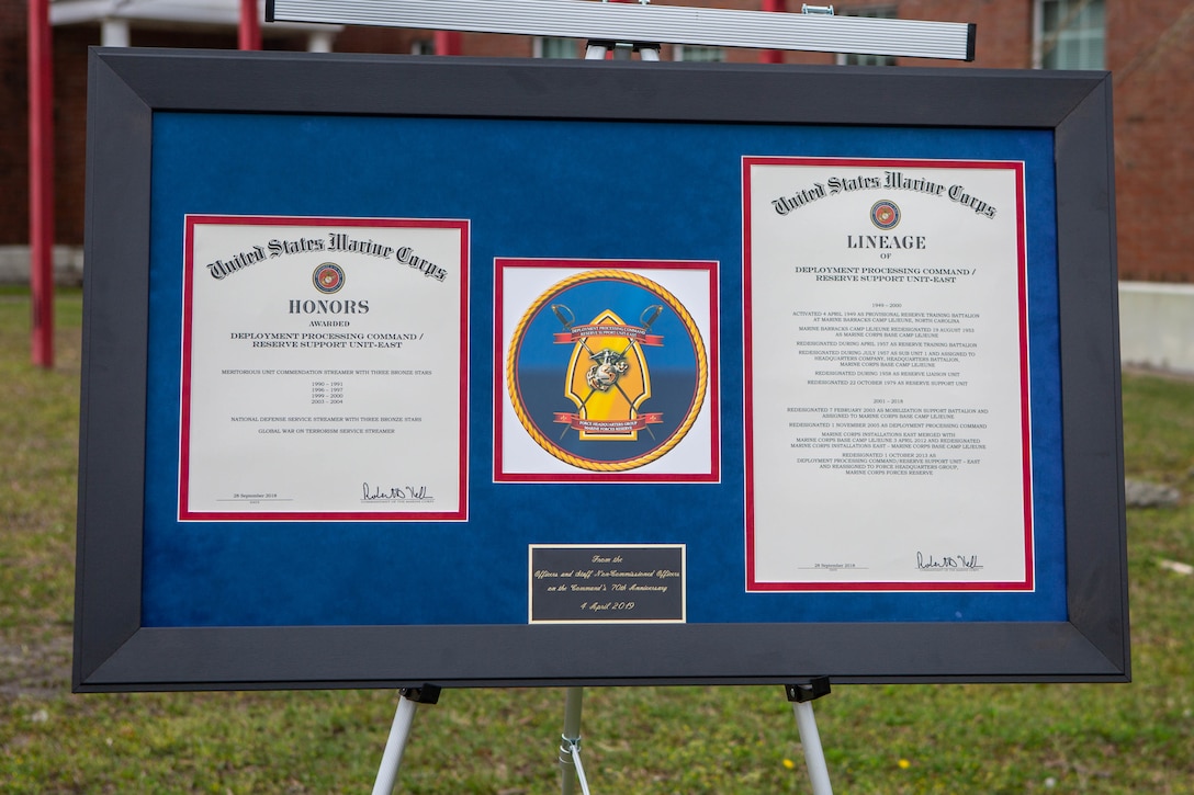 The honors and lineage for Deployment Processing Command / Reserve Support Unit-East is displayed during the rededication ceremony for DPC/RSU-East, Camp Lejeune, North Carolina, April 8.  The rededication ceremony was held to celebrate and reflect on the accomplishments of the unit for the past 70 years. (U.S. Marine Corps photo by Lance Cpl. Ashley Gomez)