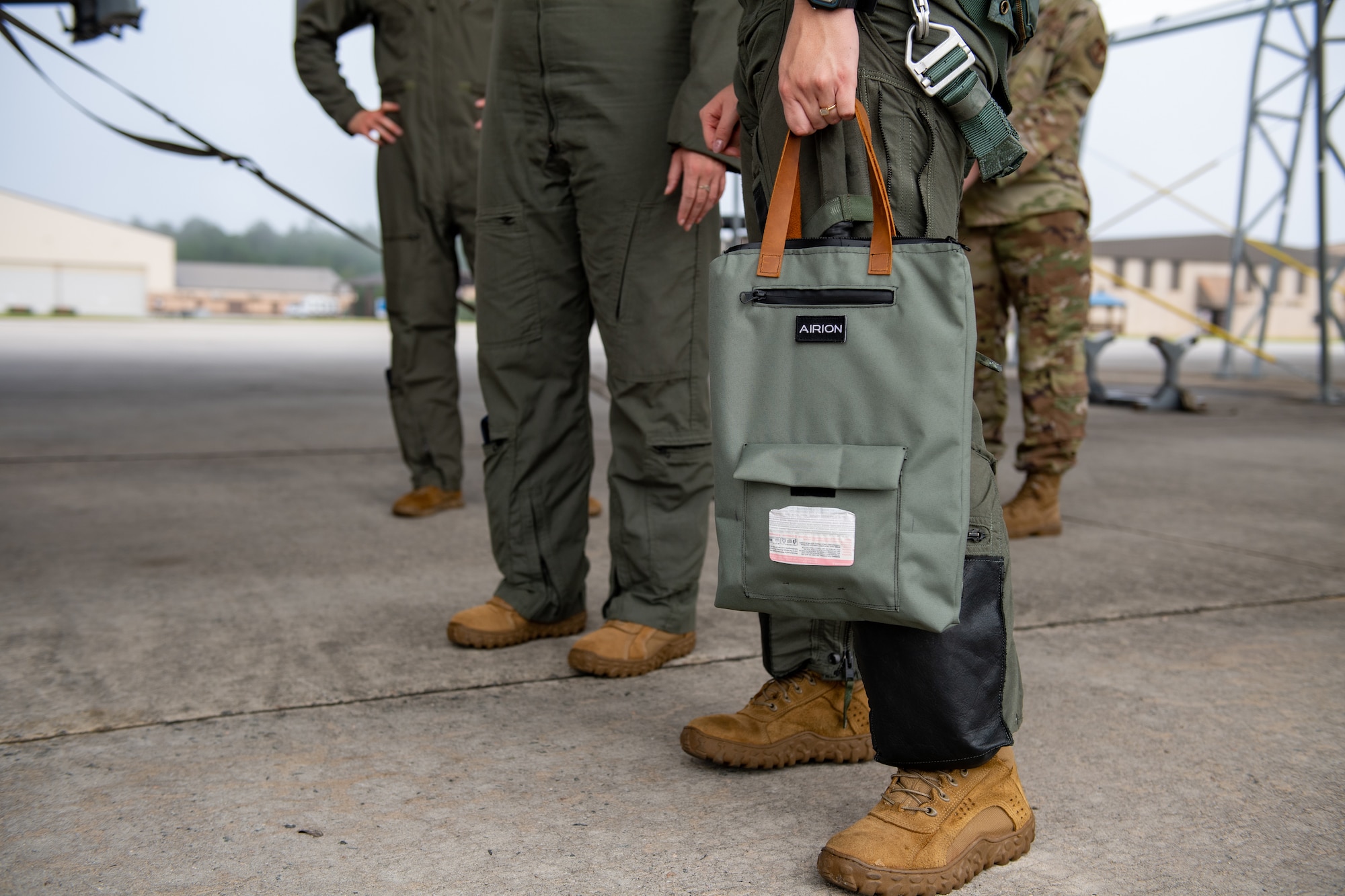 A U.S. Air Force pilot assigned to the 74th Fighter Squadron holds an Airus bladder relief system at Moody Air Force Base, Georgia, Aug. 28, 2023. The new system was tested in an effort to bring the Air Force one step closer to an effective in-flight bladder relief solution for female pilots. (U.S. Air Force photo by Senior Airman Courtney Sebastianelli)