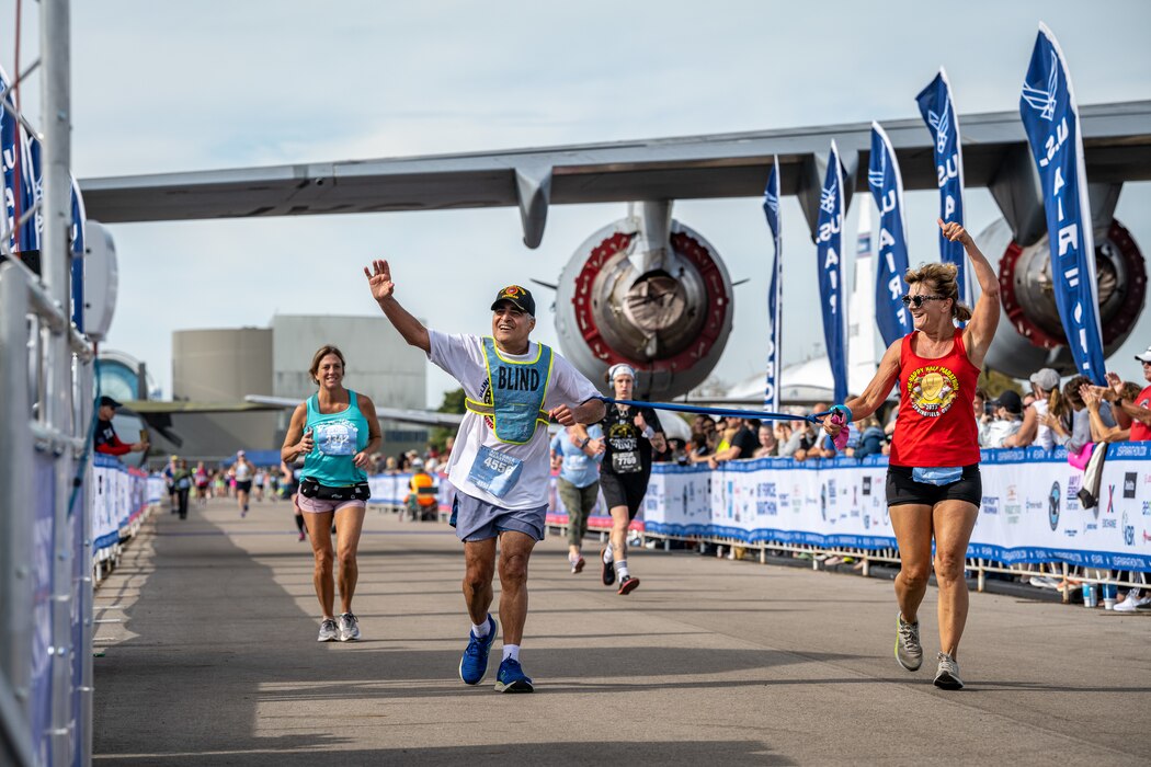 Jose Centeno, a blind veteran, finishes the half-marathon