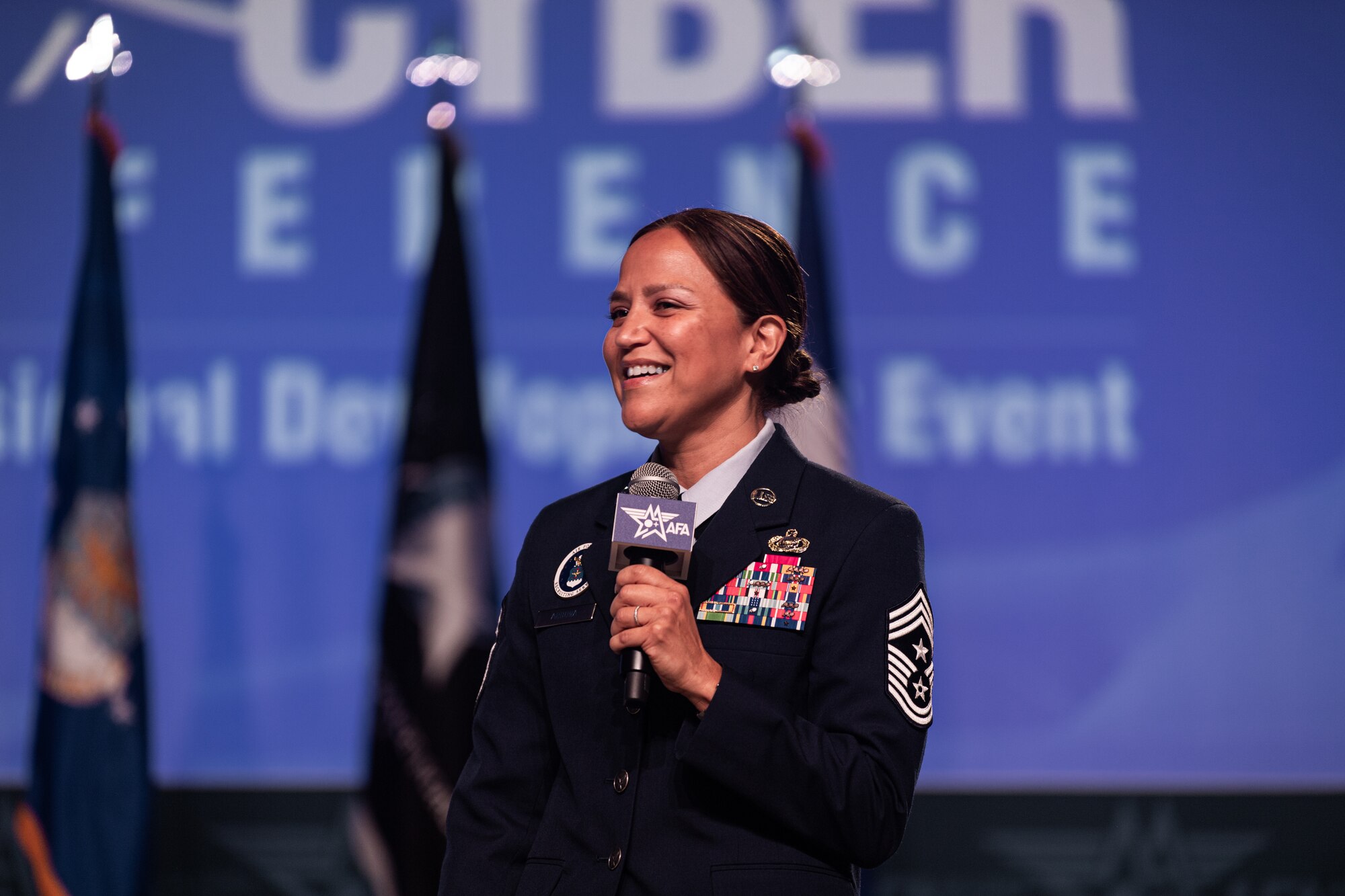 U.S. Air Force Command Chief Master Sgt. Rebecca Arbona, Air Force Recruiting Service senior enslited leader, makes remarks at the Air and Space Forces Association's Air, Space & Cyber Conference in National Harbor, Md., Sept. 11, 2023.