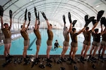 special warfare trainees at pool