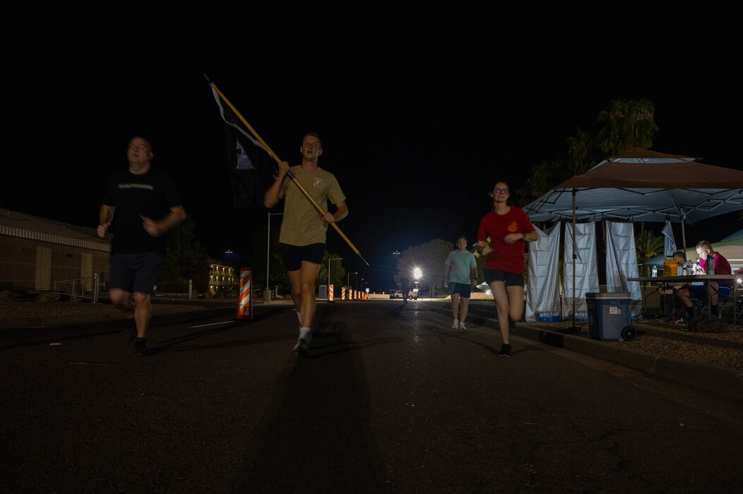 U.S. Air Force Airmen assigned to the 56th Fighter Wing participate in the 24-hour POW/MIA vigil, Sept. 14, 2023, at Luke Air Force Base, Arizona.