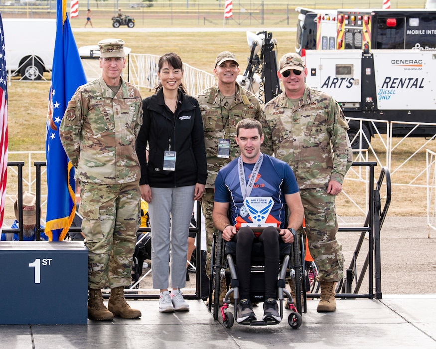 Wheeled race finisher with Air Force leaders