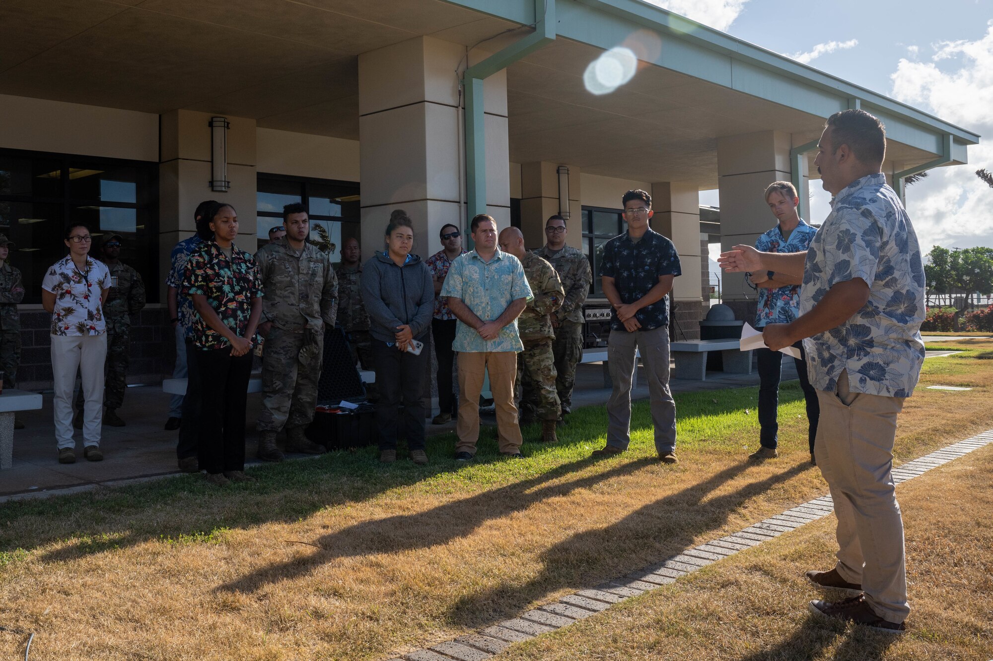 Master Sgt. Robert Phillips, 15th Maintenance Squadron production superintendent, briefs Airmen from the 15th Maintenance Group during a commercial satellite kit demo at Joint Base Pearl Harbor-Hickam, Hawaii, August 11, 2023. Members from the 15th MXS are in the early stages of using the commercial satellite system to improve connectivity to prepare for agile combat employment concept deployments. (U.S. Air Force photo by Senior Airman Makensie Cooper)