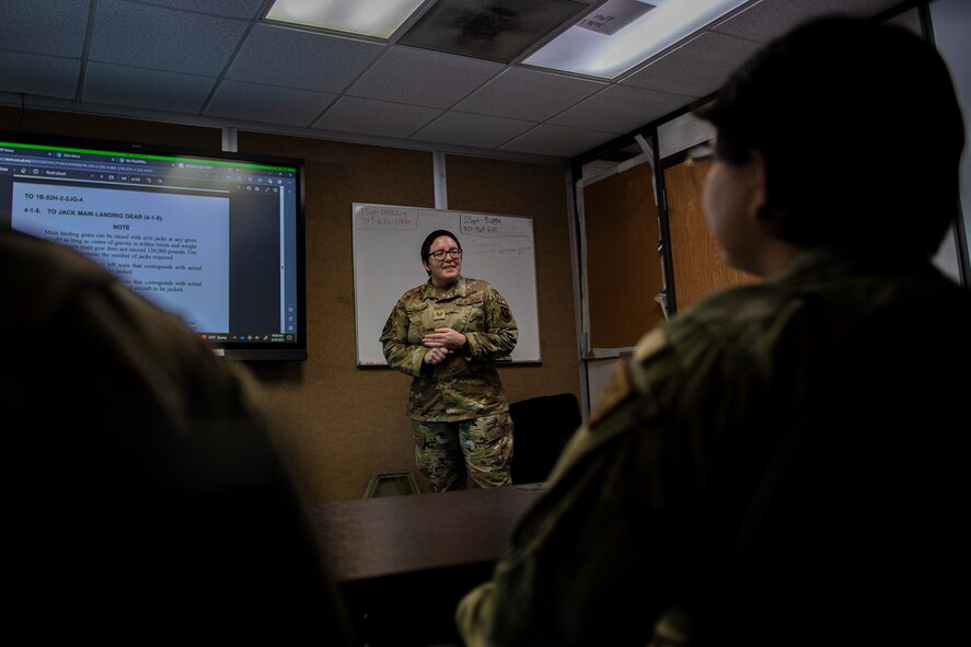Tech. Sgt. Stephenie Molloy, 372nd Training Squadron, Detachment 22 B-52H Stratofortress aircraft maintenance instructor, gives a lecture in a Det. 22 classroom at Minot Air Force Base, North Dakota, Aug. 28, 2023. A major focus for Det. 22 leadership is to inspire students to care more deeply about their jobs. (U.S. Air Force photo by Airman 1st Class Alyssa Bankston)